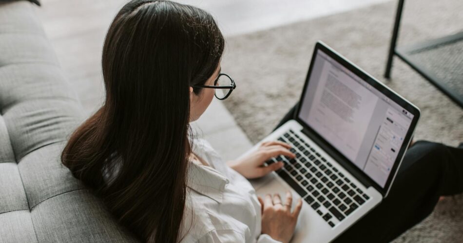 woman working at home using her laptop