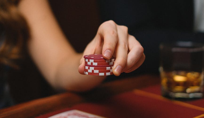 woman with chips in casino